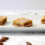If you're into the flavor of marzipan, then you'll like these layered almond shortbread bars. #raspberry #almond #shortbread #barcookies