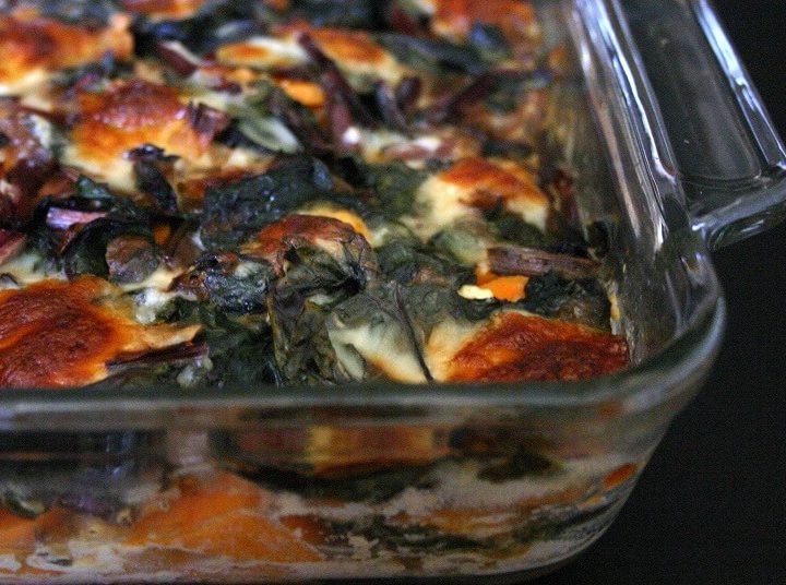 All the leafy greens in this Swiss chard and sweet potato gratin get mellowed out by bubbly, browned cheese. #swisschard #sweetpotato #vegetarian #entree