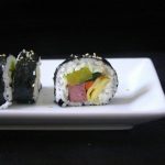 The inside of this spam kimbap looks like a kaleidoscope, with pickled radish, spinach, carrots, eggs and Spam. #spam #kimbap #korean #sushi