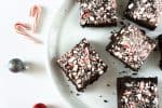 These three layer peppermint brownies are perfect if you're in a mint chocolate kind of mood! #brownies #chocolate #peppermint #candycanes #mintchocolate