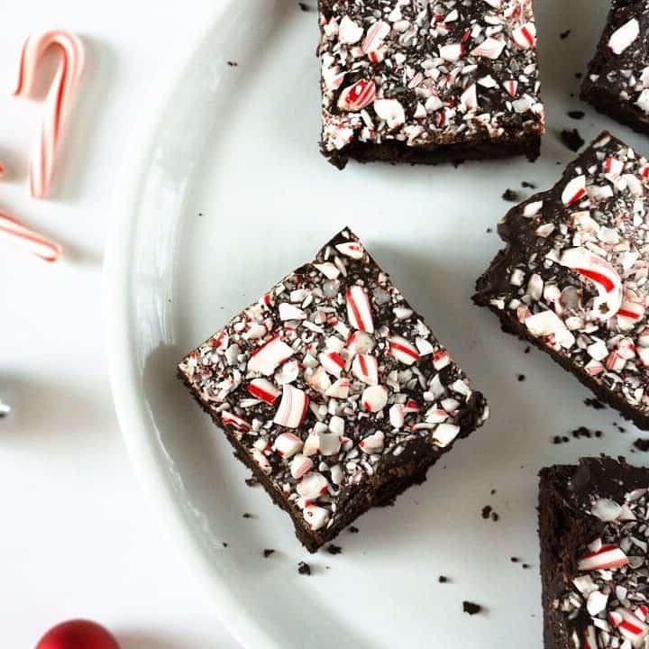 These three layer peppermint brownies are perfect if you're in a mint chocolate kind of mood! #brownies #chocolate #peppermint #candycanes #mintchocolate