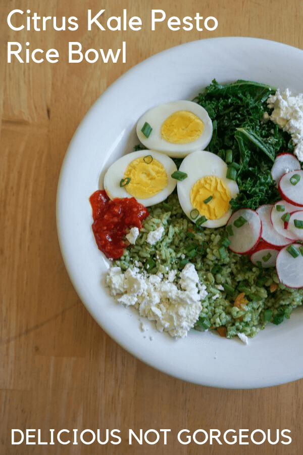 Green rice topped with kale, radish slices, hard boiled egg halves, crumbled feta and a spoonful of hot sauce.