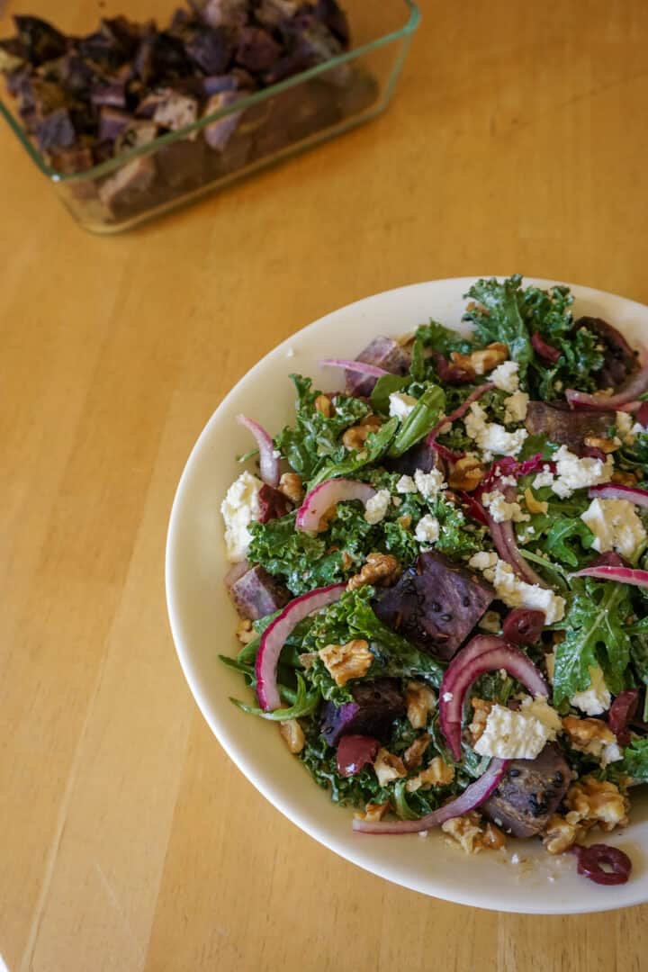 If you like a lot of toppings in your salads, this is it! There's a kale base, but it's topped with creamy sweet potatoes, creamy feta, crispy walnuts and crunchy pickled red onions.