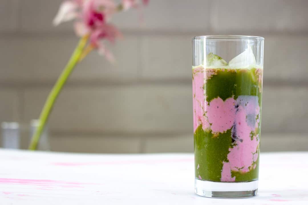 This matcha rose latte is a delicious balance of strong matcha and creamy rose-scented milk. #matcha #matchalatte #greentea