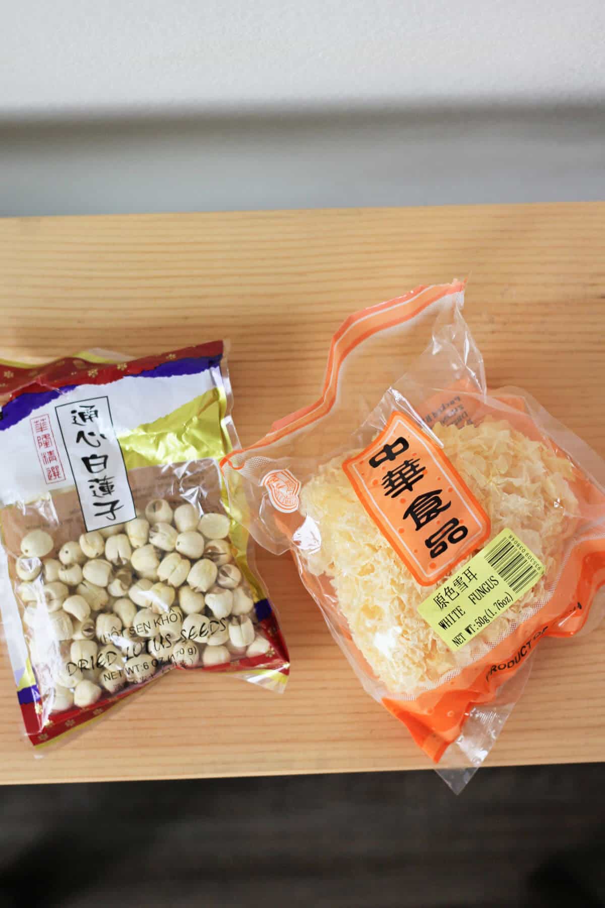 Bag of dried lotus seeds and bag of dried snow fungus.